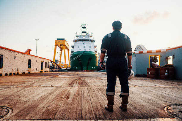 engineer-stands-on-deck-ship